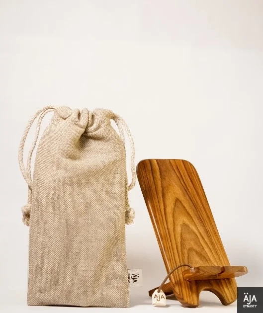 https://s3.vistaartrade.anukul.com.np/vistaartrade/media/products/2022/10/10/Wooden_Smartphone_Stand_Big.webp