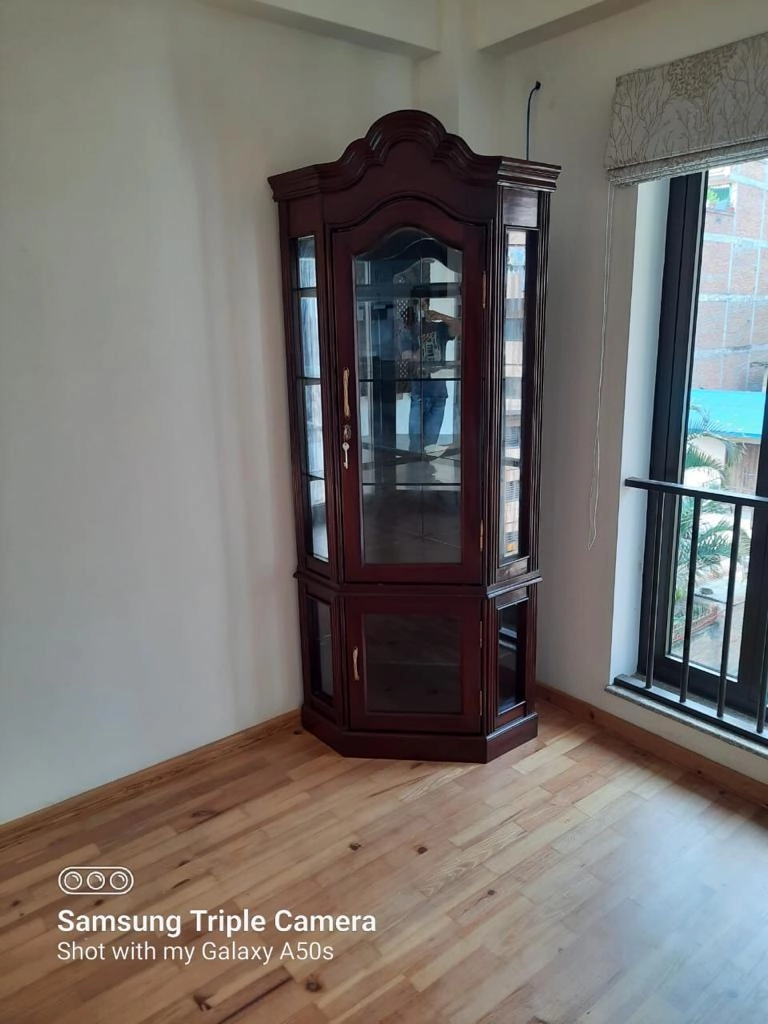 https://s3.vistaartrade.anukul.com.np/vistaartrade/media/products/2022/10/18/Corner_stand_cabinet.webp