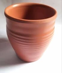 https://s3.vistaartrade.anukul.com.np/vistaartrade/media/products/2023/06/04/DINEWELL_KULLHAD_SMALL_TERACOTTA.webp